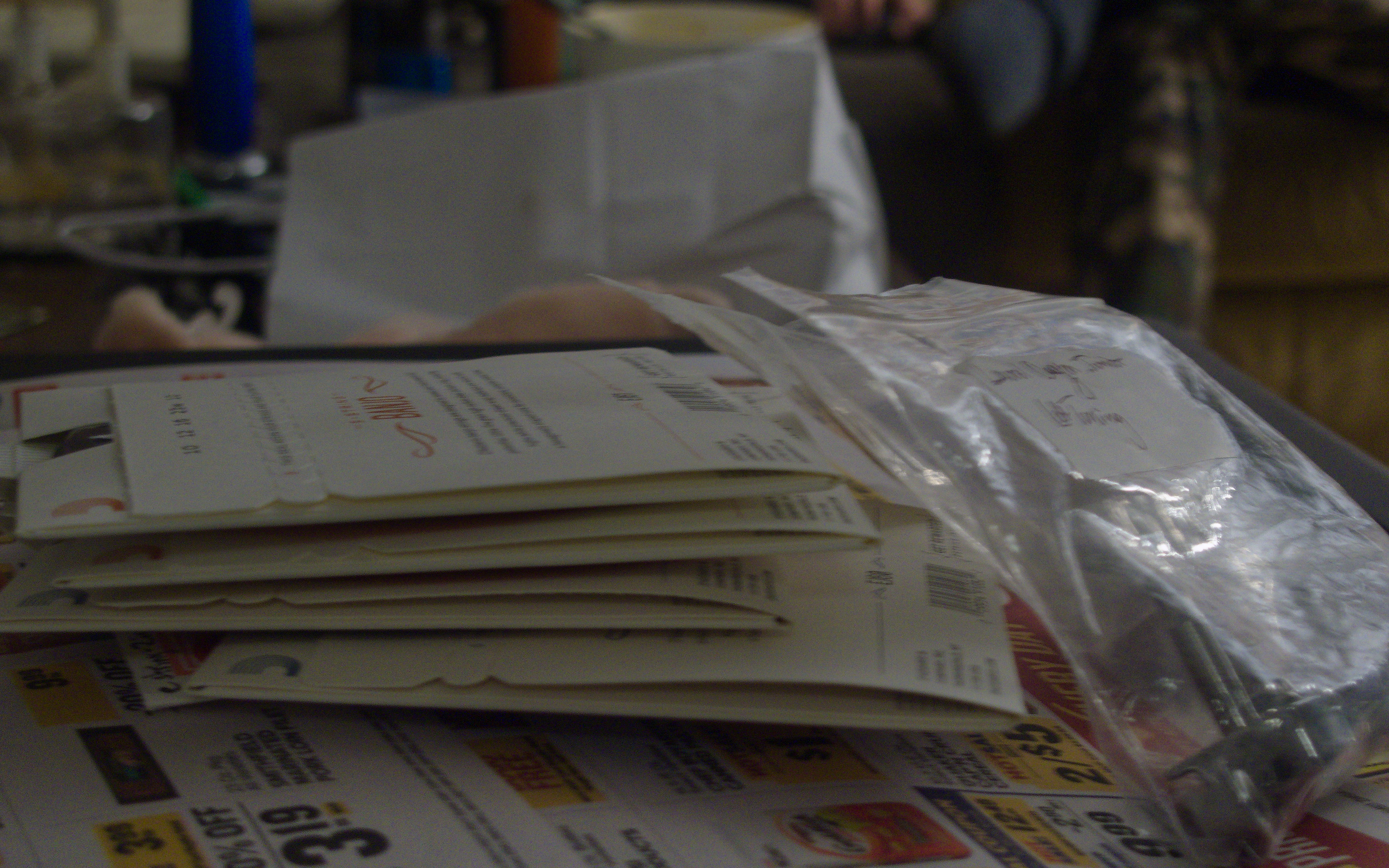 Four sets of banjo strings and one set of three junior guitar tuning heads.