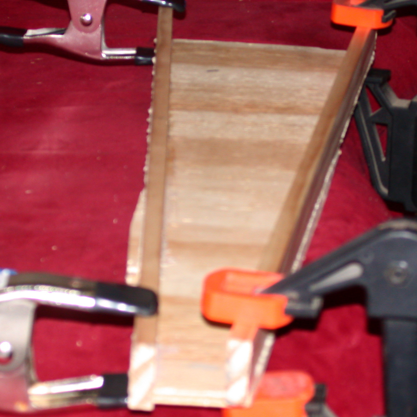 the bottom and walls of the body glued and clamped.